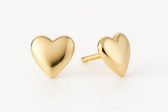 Close-up of 14k gold-plated heart earrings, perfect for birthday gifts for nana&#39;s.