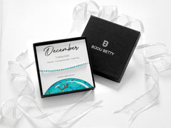 Sterling silver 3mm turquoise CZ bracelet in Bijou Betty box with birthday card, ideal for daughters.