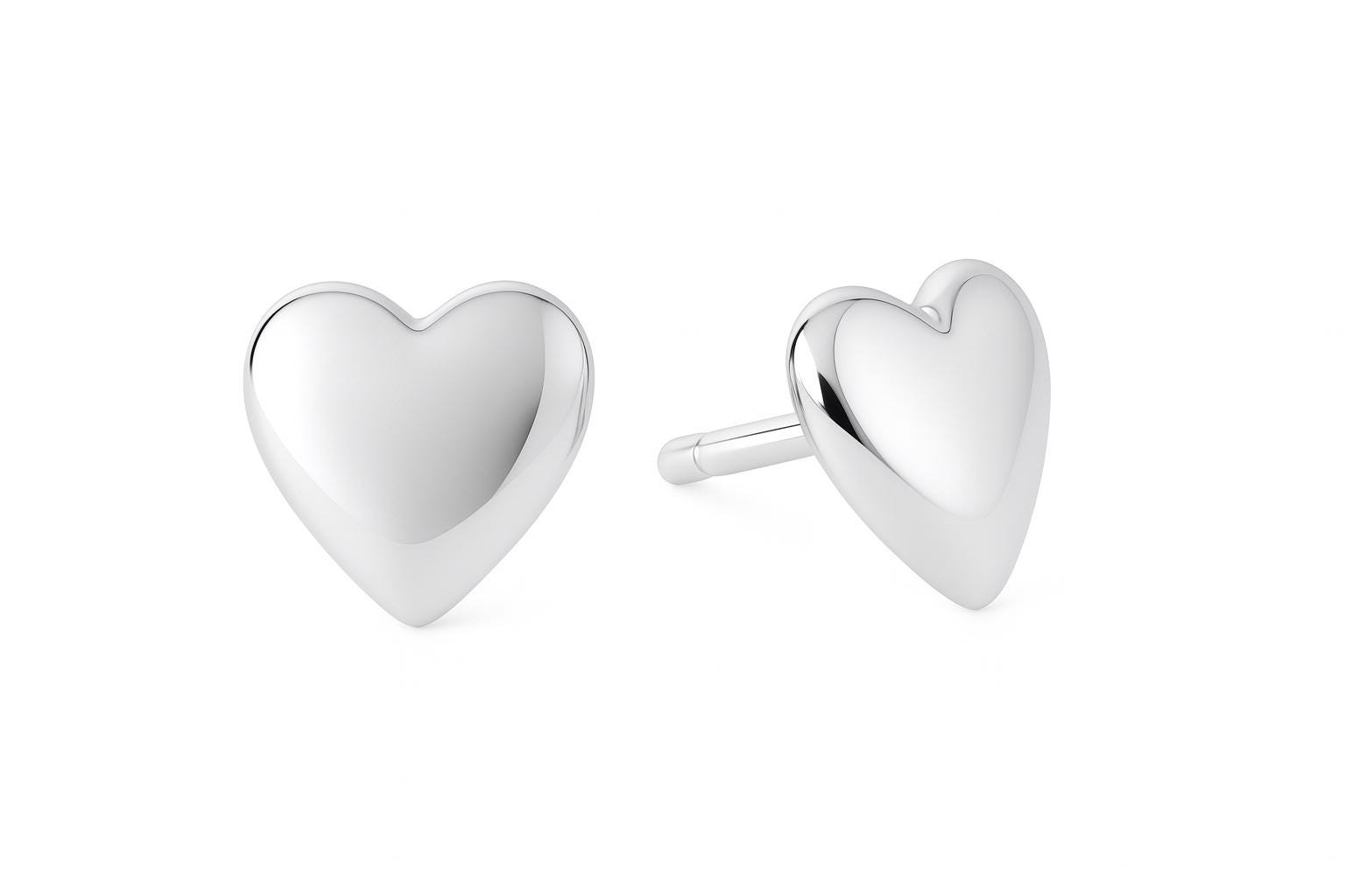 Close-up of silver heart earrings, perfect for 30th birthday gifts for girlfriends.