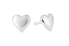 Close-up of silver heart earrings, perfect for Christmas gifts for girlfriends.