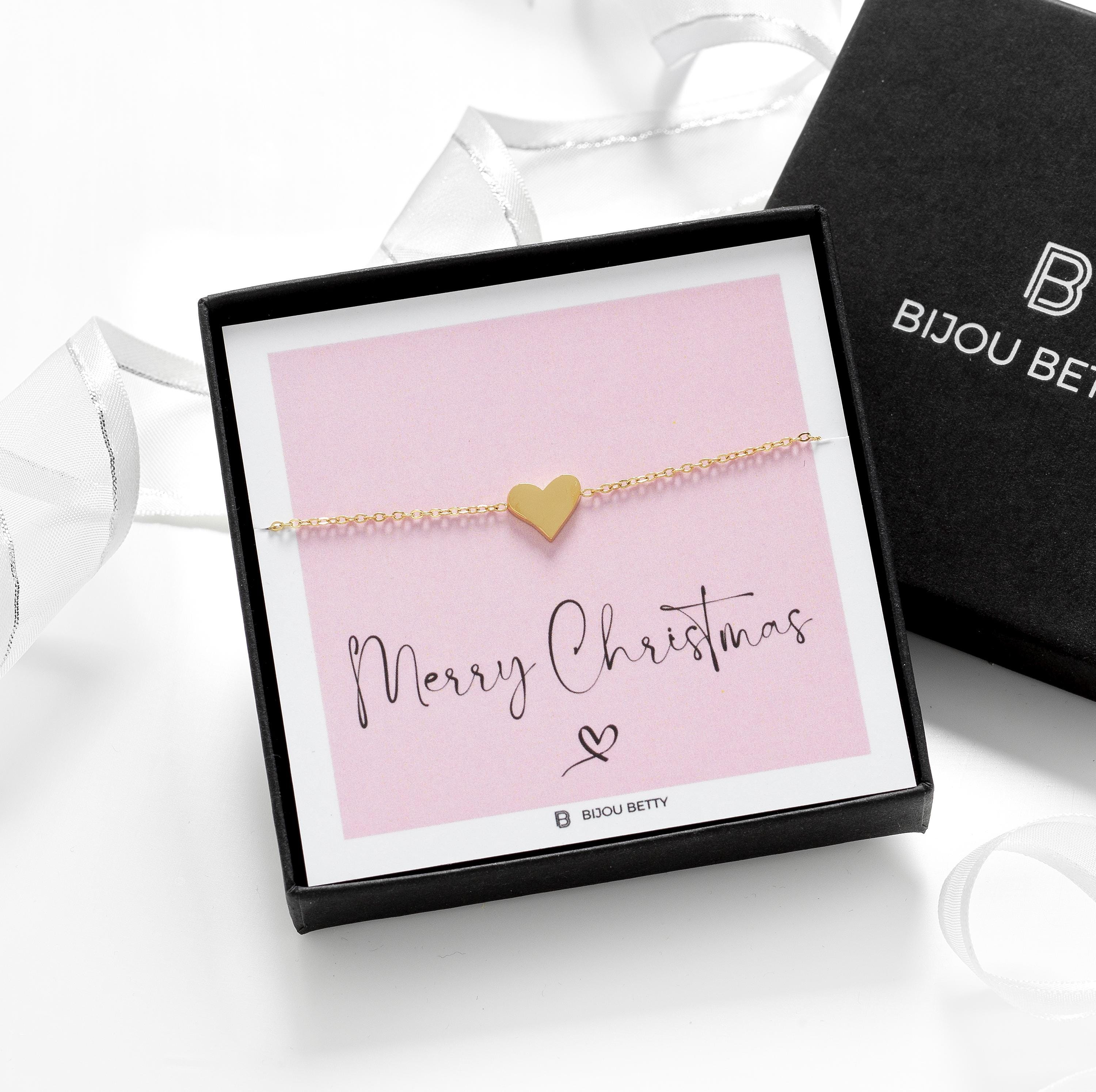 Close-up of gold-plated heart bracelet, perfect for Christmas gifts for mums.