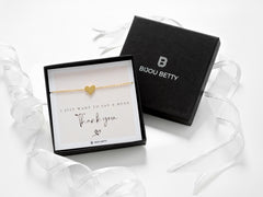 18k gold-plated 10mm heart bracelet in Bijou Betty box with thank you card, ideal for friends.