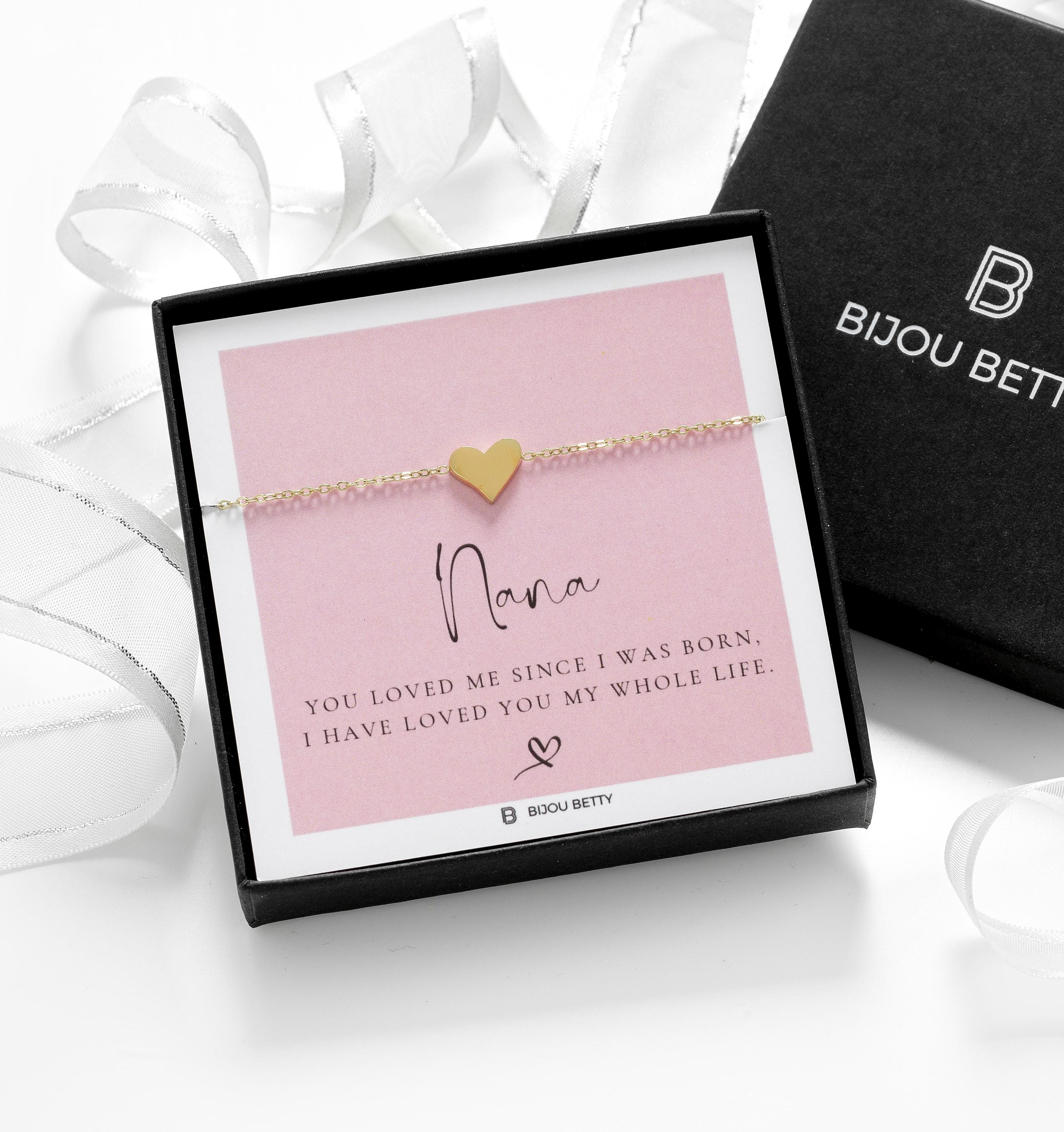 Close-up of gold-plated heart bracelet, perfect for Christmas gifts for grandmothers.