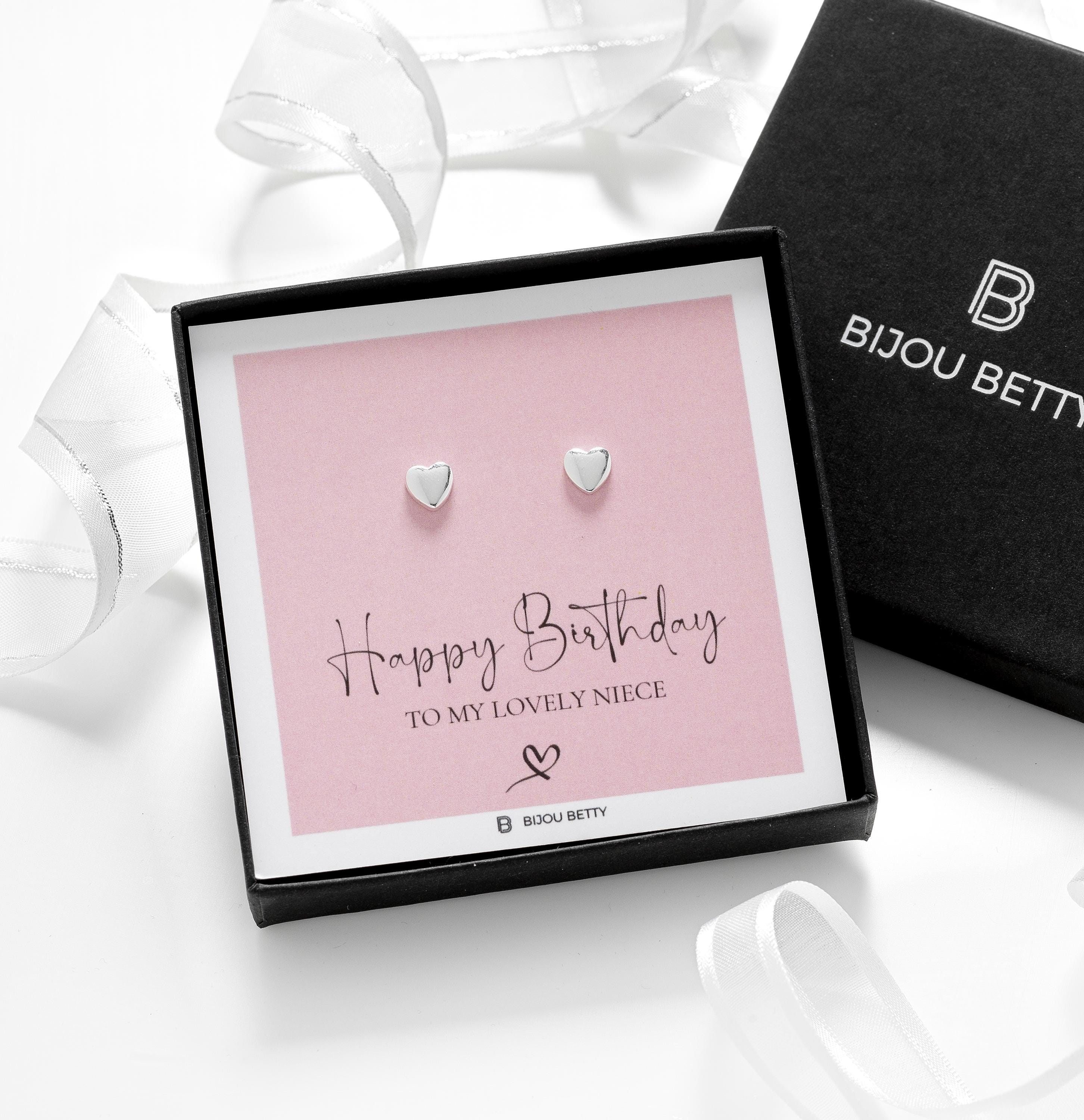 Close-up of 14k gold-plated heart earrings, perfect for niece birthday gifts.