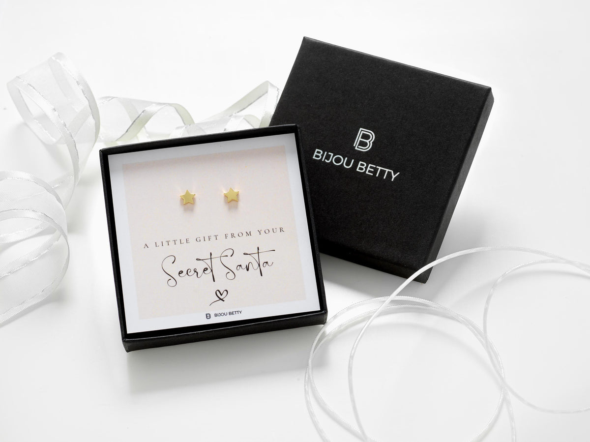 Sterling silver 6.5mm star earrings in Bijou Betty box with Secret Santa card, ideal for daughters.