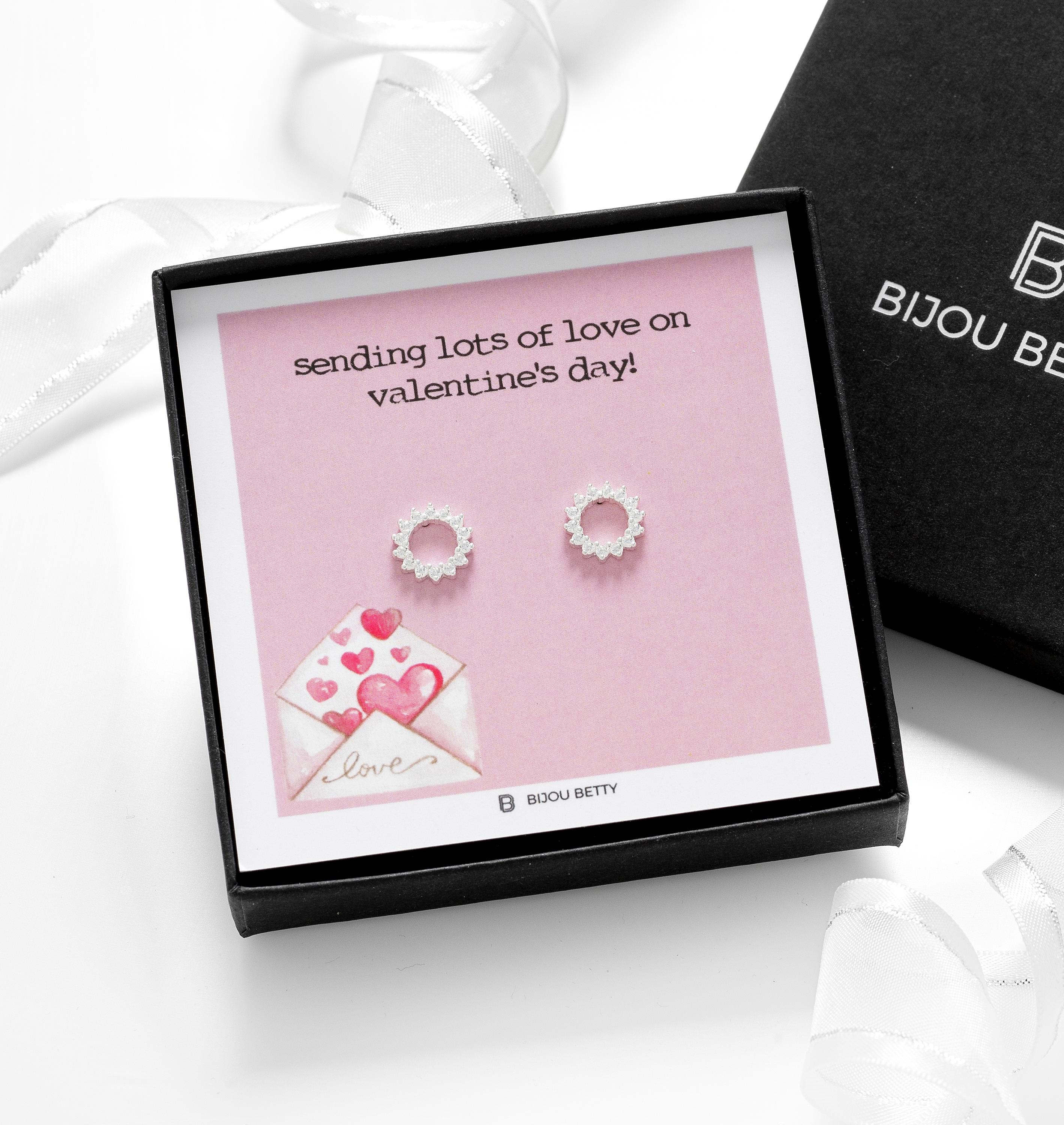 Close-up of 18k gold-plated sunburst earrings, perfect for Valentine's Day gifts for girlfriends.