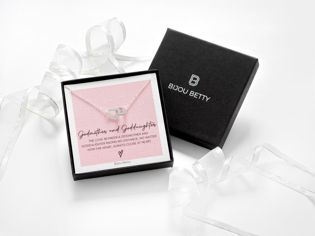 Sterling silver godmother goddaughter necklace with heart pendant and CZ stones in Bijou Betty gift box.