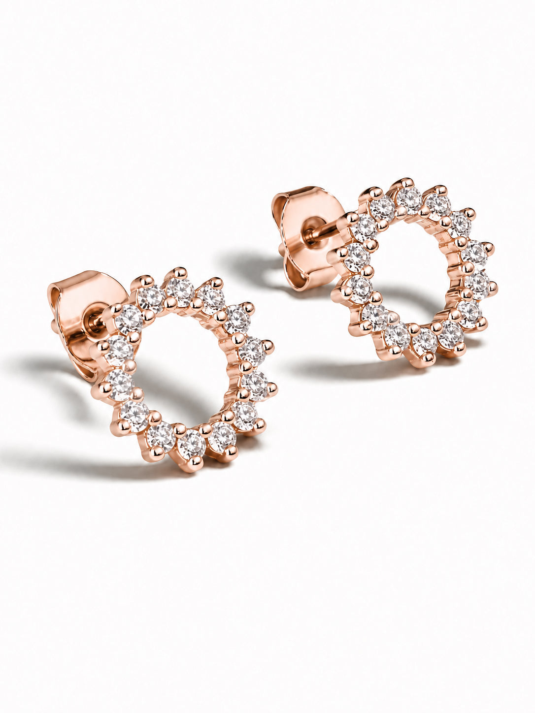 Rose gold hoop stud earrings with a halo of clear round-cut gemstones, shown on a clean white background.
