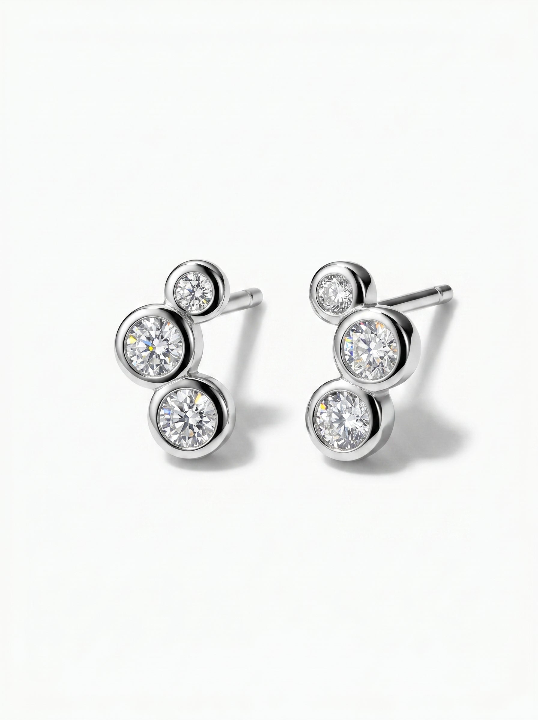 Solid 925 sterling silver cubic zirconia stud earrings on a white background.
