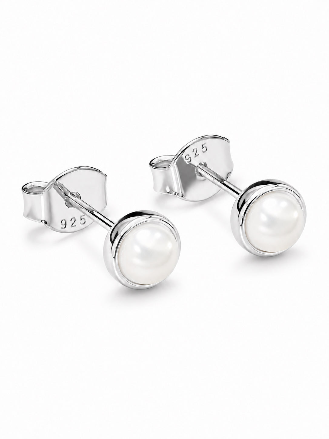 Pair of silver stud earrings with pearls on a white background